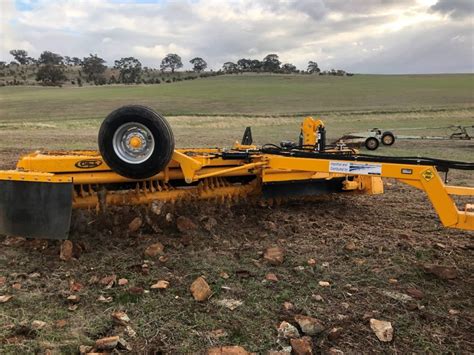 tractor attachments for breaking rocks